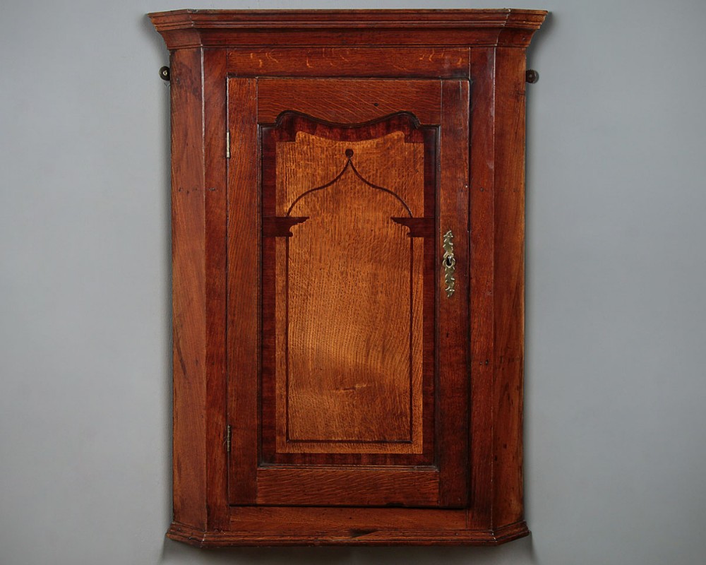 Small Oak Hanging Corner Cupboard with Inlaid Door c.1800