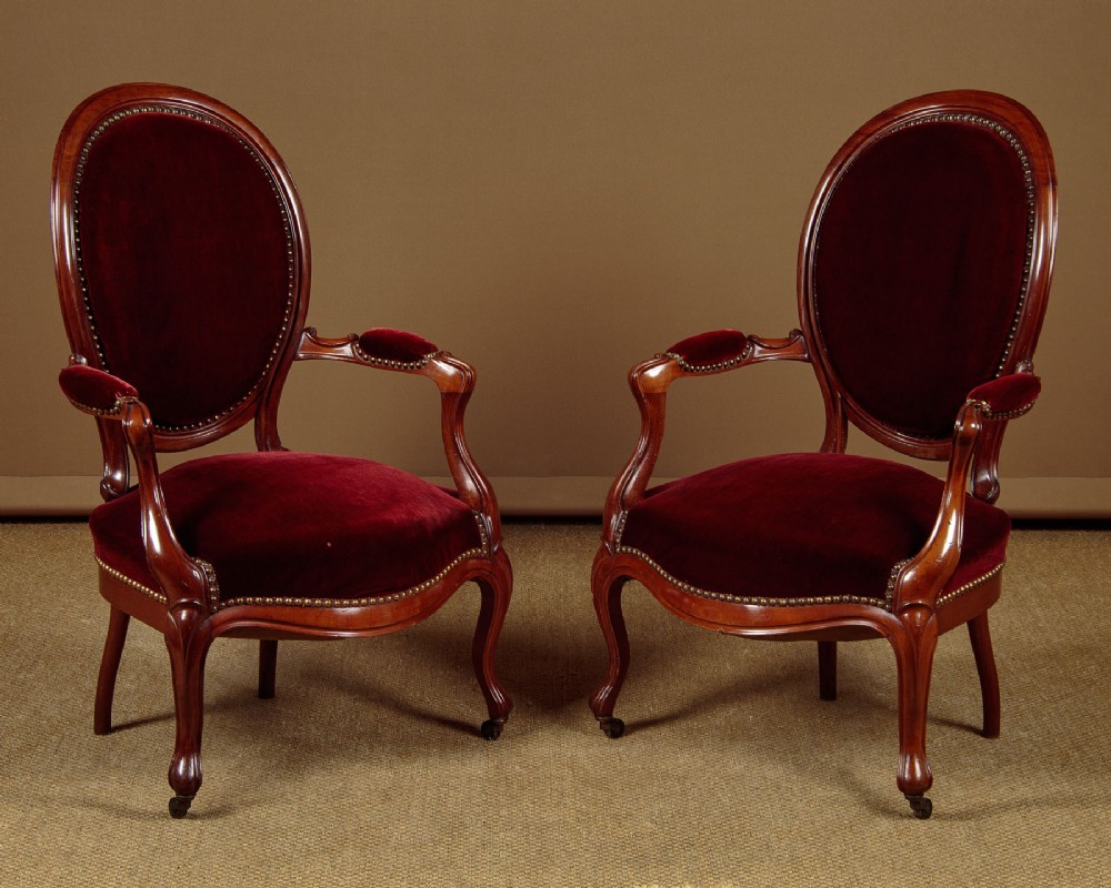Pair of Walnut Open Armchairs c.1880.