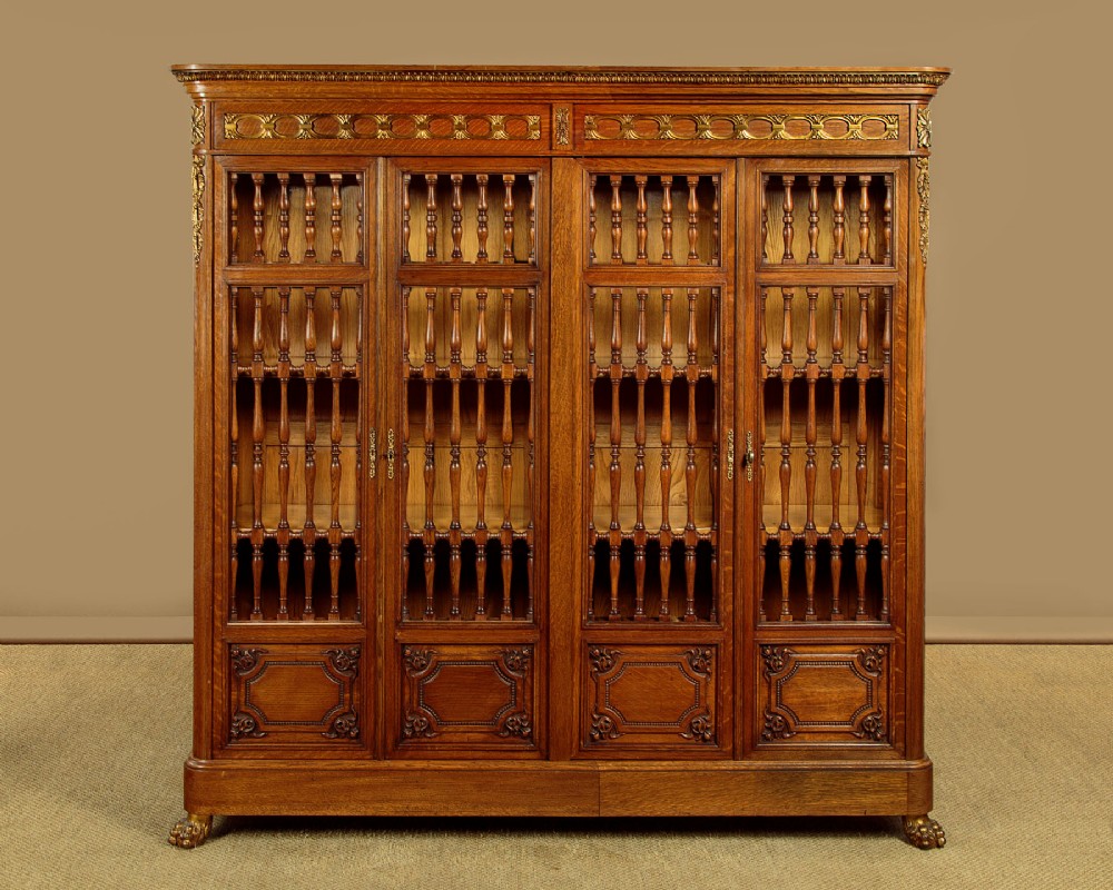 Gilt Mounted Oak Spindle Front Bookcase c.1900