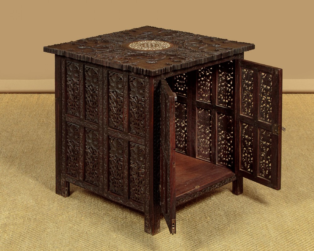 A dark wood square Anglo-Indian side table decorated with reticulated foliate carving on all panels and a circular bone inlay detail in the centre top. View IV