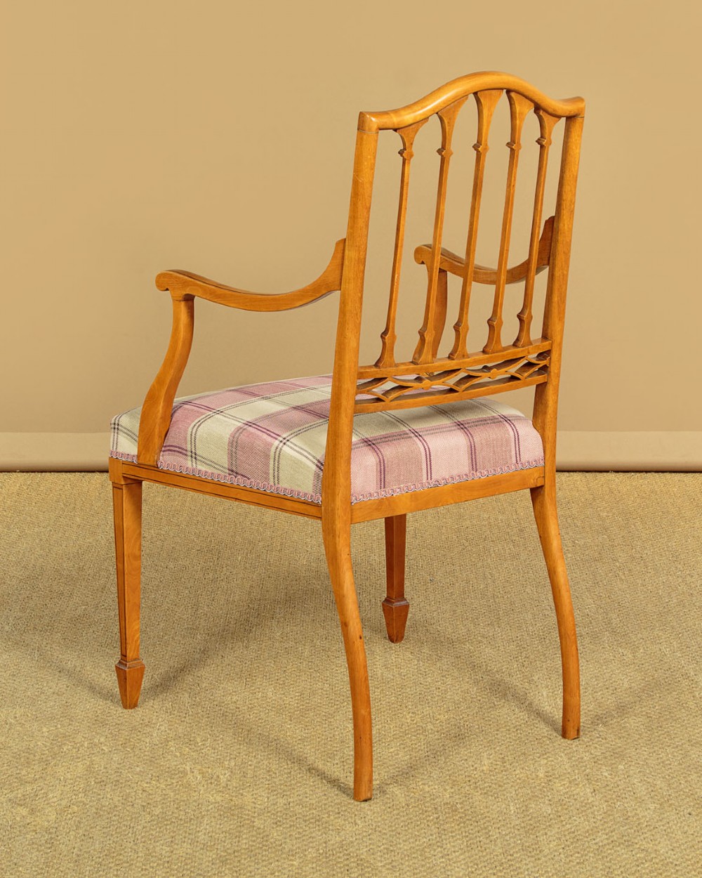 A pair of inlaid satinwood armchairs featuring arched spindle backrests and pink plaid upholstered seats. View XIII