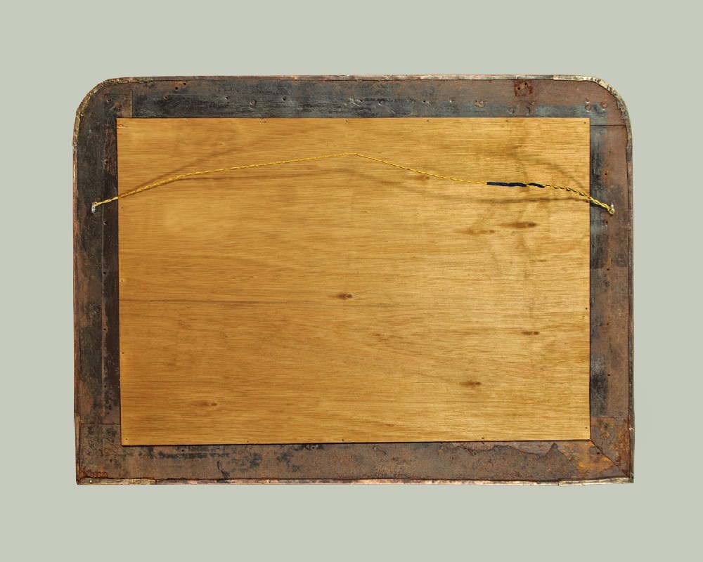 A rectangular Arts and Crafts wall mirror featuring a hand-hammered copper frame accented with repousse floral motifs and brass corner spandrels. View IX