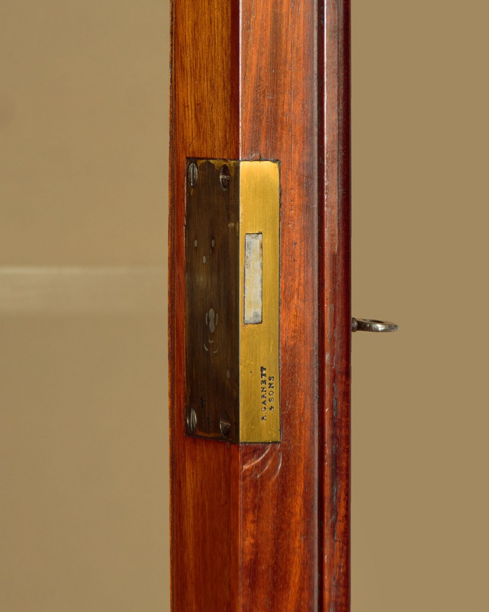 Tall Mahogany Bookcase by Garnett & Sons c.1850 View VI