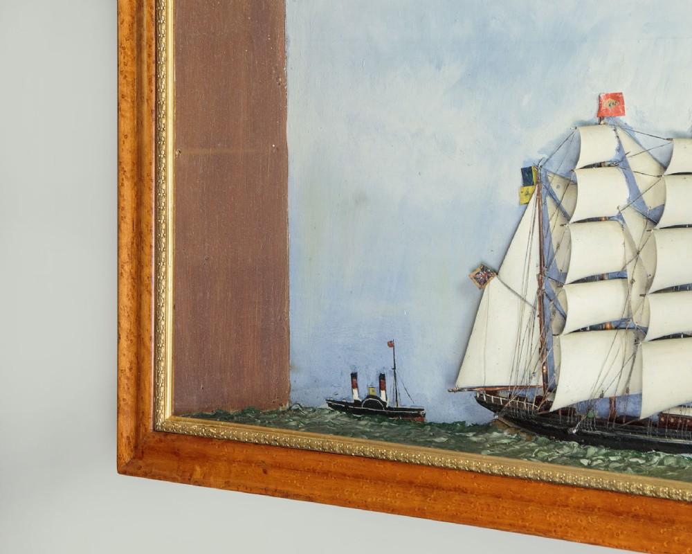 A three-dimensional antique maritime diorama featuring a three-masted sailing ship framed in a deep glazed wooden box with a painted sky and sea background. View XIII