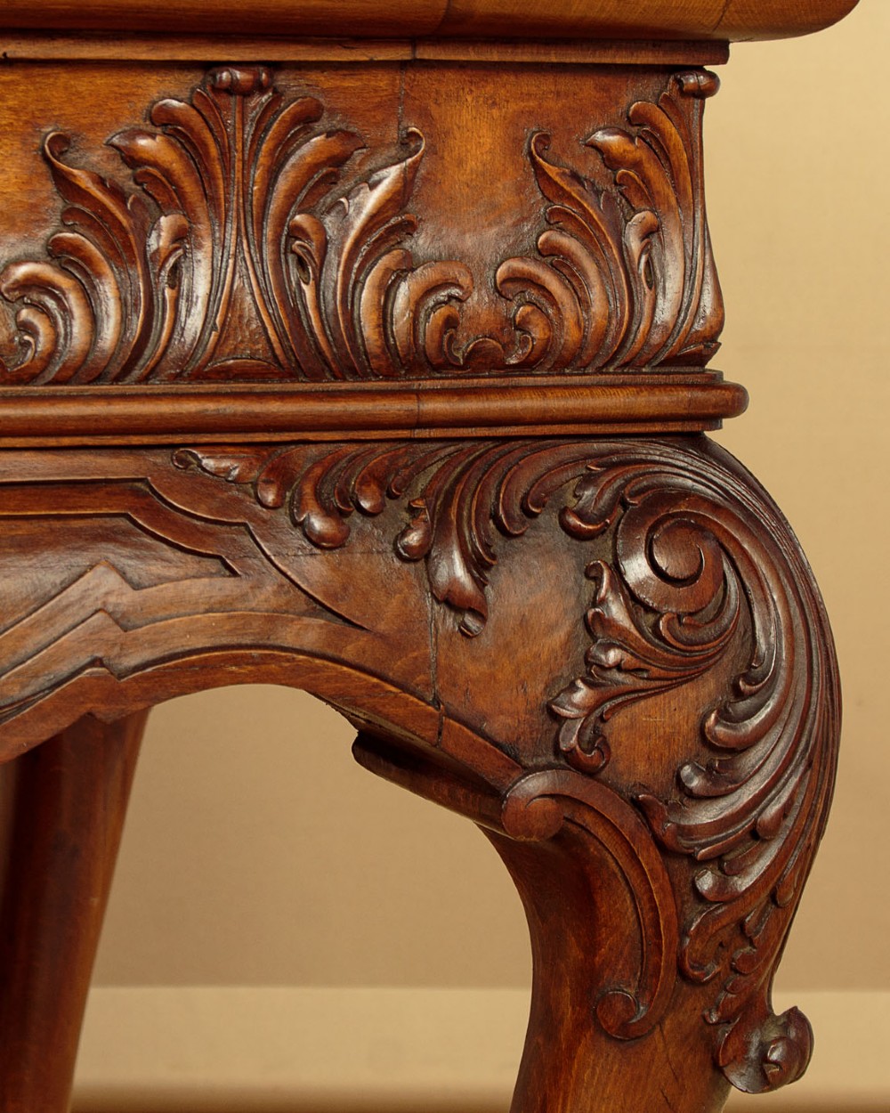 A George II style side table featuring a carved wooden frame with cabriole legs, ball and claw feet, and a polished dark marble top. View X
