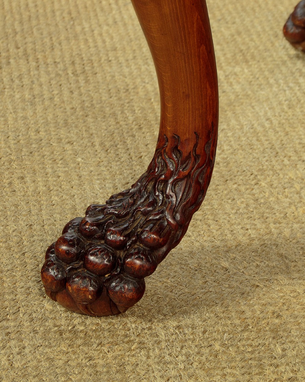 A George II style side table featuring a carved wooden frame with cabriole legs, ball and claw feet, and a polished dark marble top. View XI