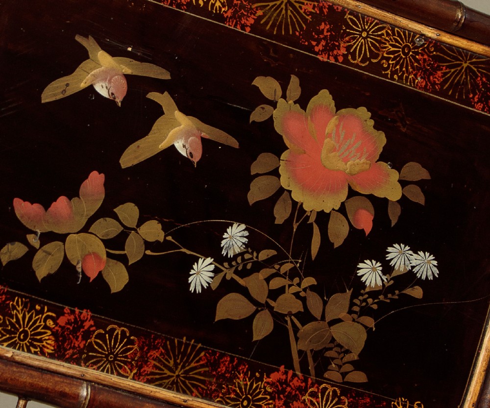 Late Victorian dark bamboo hall stand featuring a central diamond mirror, a hand-painted floral lacquer panel, coat pegs, and a stick stand base. View VII