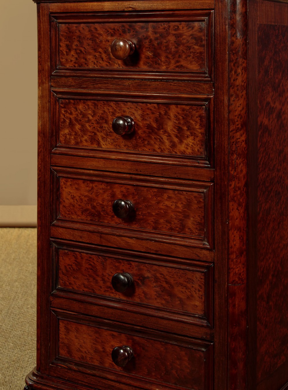 A pair of late Victorian dark rosewood and amboyna veneer tall bedside drawer pedestals featuring grey marble tops and turned wooden knobs. View VIII