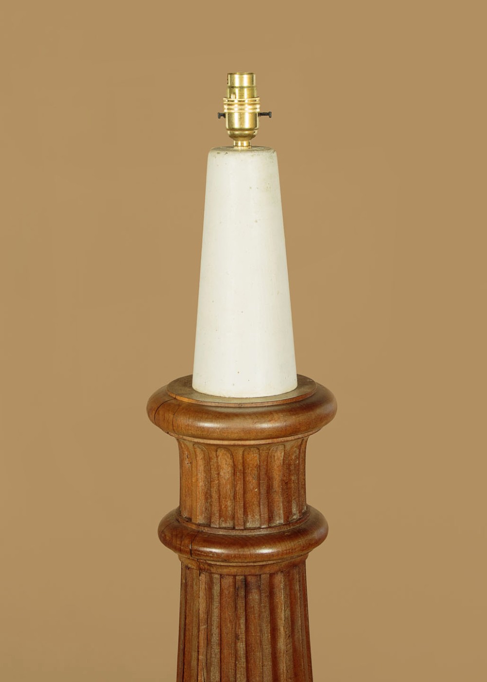 A pair of carved walnut standard lamps featuring fluted tapered shafts, acanthus scroll bases, and candle-style bulb sockets. View IV