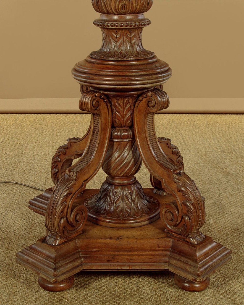 A pair of carved walnut standard lamps featuring fluted tapered shafts, acanthus scroll bases, and candle-style bulb sockets. View VIII