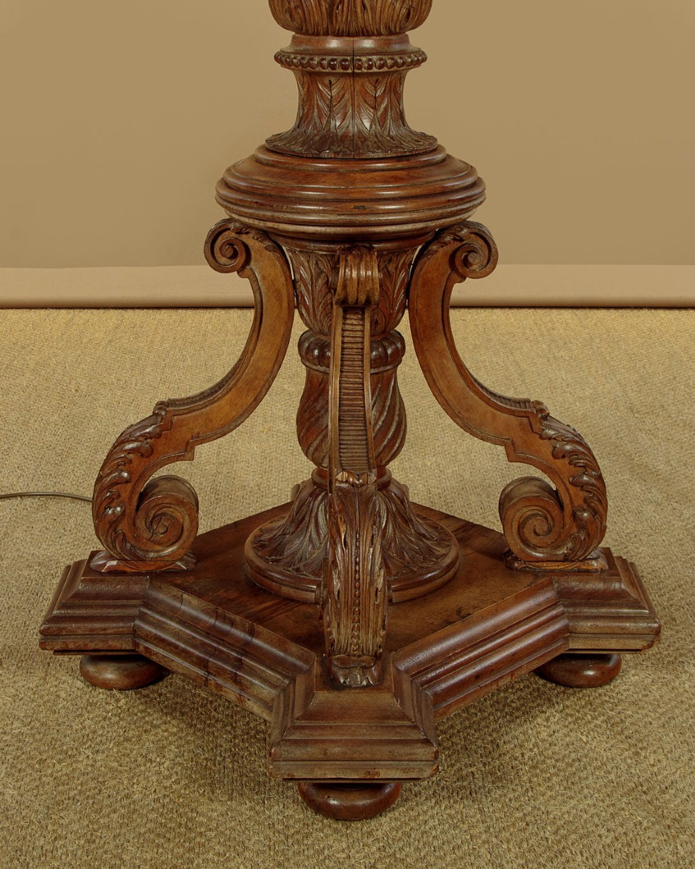 A pair of carved walnut standard lamps featuring fluted tapered shafts, acanthus scroll bases, and candle-style bulb sockets. View IX
