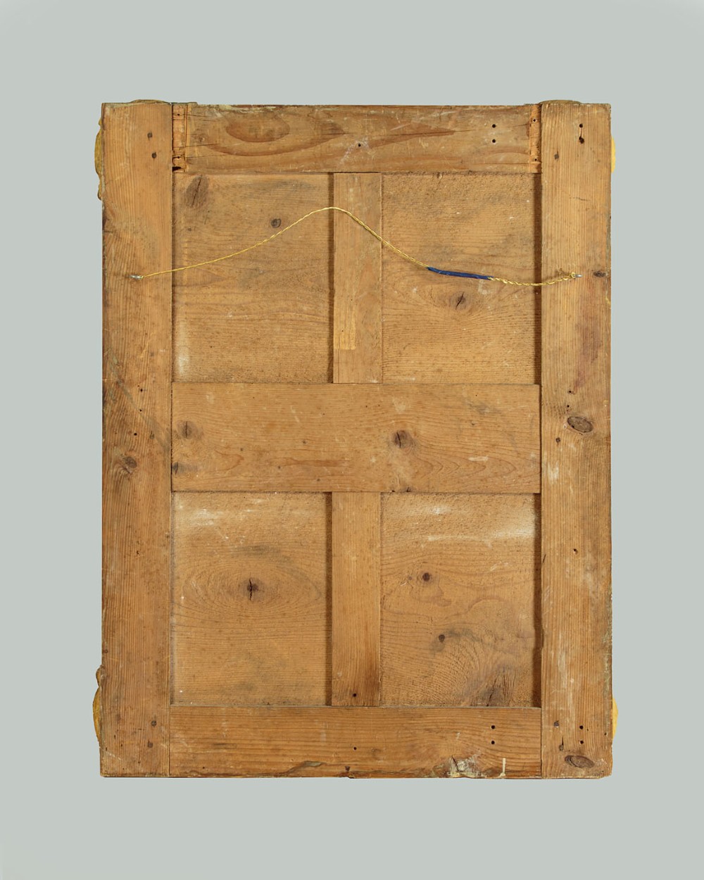A late 19th-century rectangular French giltwood wall mirror featuring carved corner cartouches, gadrooned borders, and visible red bole beneath gold leaf. View VIII