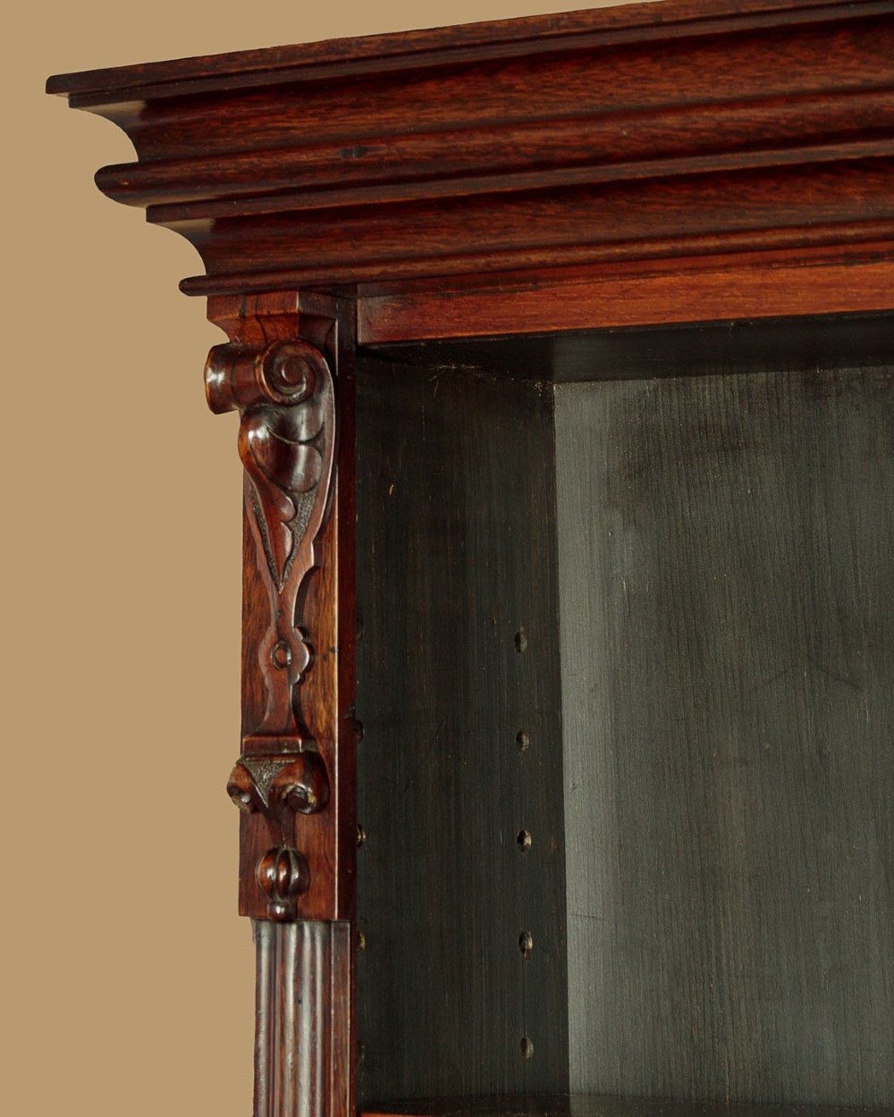 A mid-19th century dark rosewood open breakfront bookcase featuring a central projecting section flanked by narrower side shelves. View VI