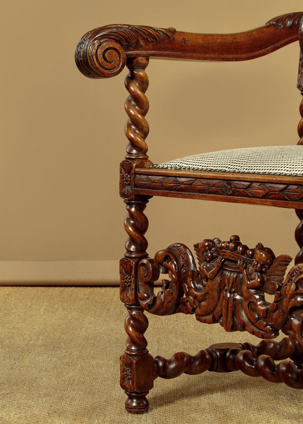 A pair of carved walnut armchairs featuring oval cane back panels, scroll armrests, and barley twist legs. View XIV