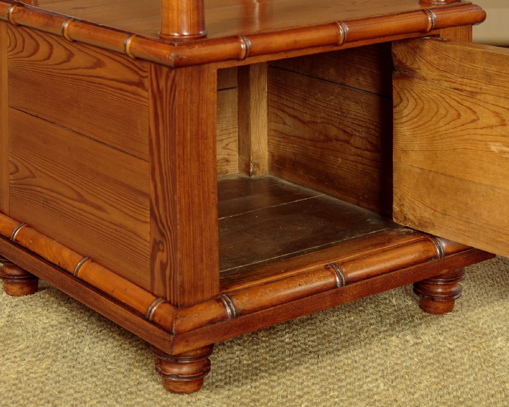 Late 19th-century faux bamboo wooden bedside cabinet featuring turned bamboo-style supports, an upper drawer with diamond moulding, an open shelf, and a lower drawer section. View IX