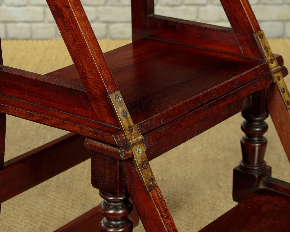 A late Victorian metamorphic mahogany side chair with turned front legs that folds open to convert into a short flight of library steps. View VIII