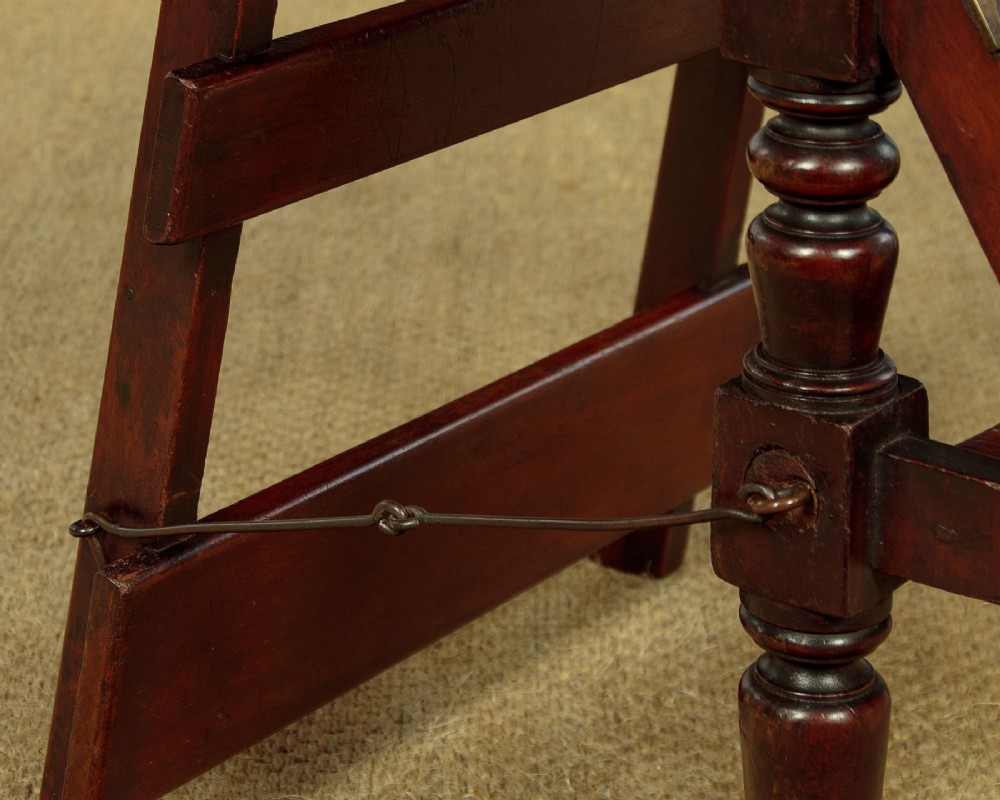 A late Victorian metamorphic mahogany side chair with turned front legs that folds open to convert into a short flight of library steps. View IX