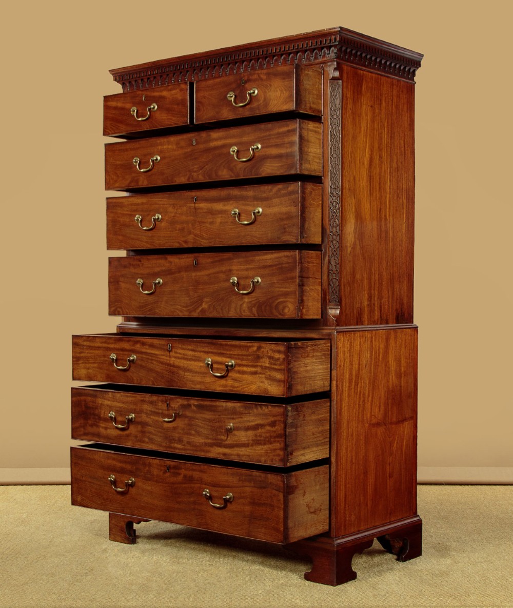 A Georgian mahogany chest on chest with two short over six long graduated drawers, featuring brass handles and bracket feet. View III