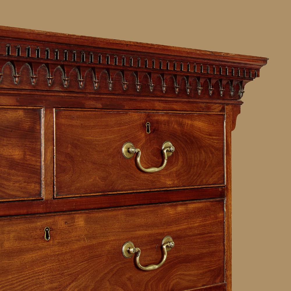 A Georgian mahogany chest on chest with two short over six long graduated drawers, featuring brass handles and bracket feet. View IV