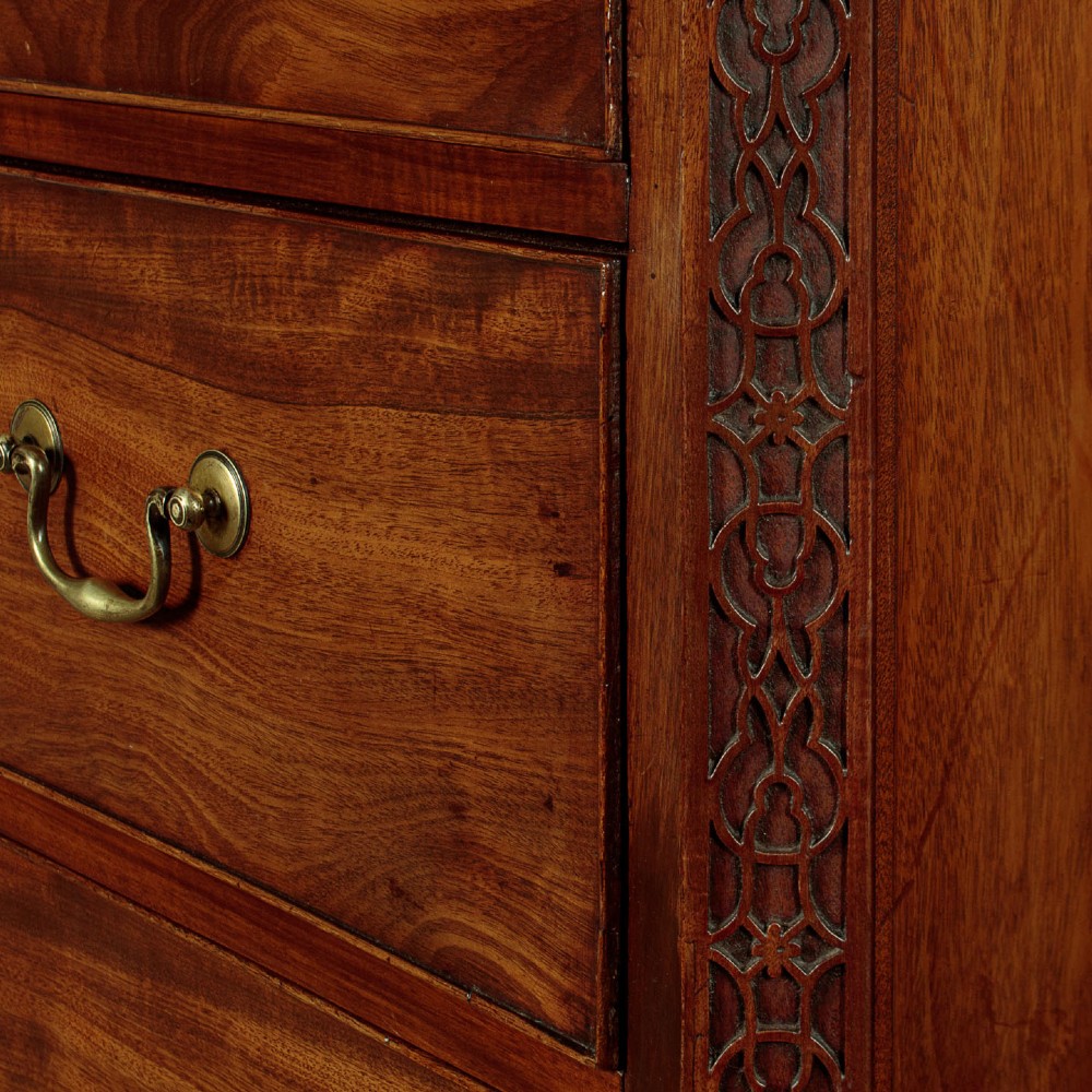 A Georgian mahogany chest on chest with two short over six long graduated drawers, featuring brass handles and bracket feet. View V
