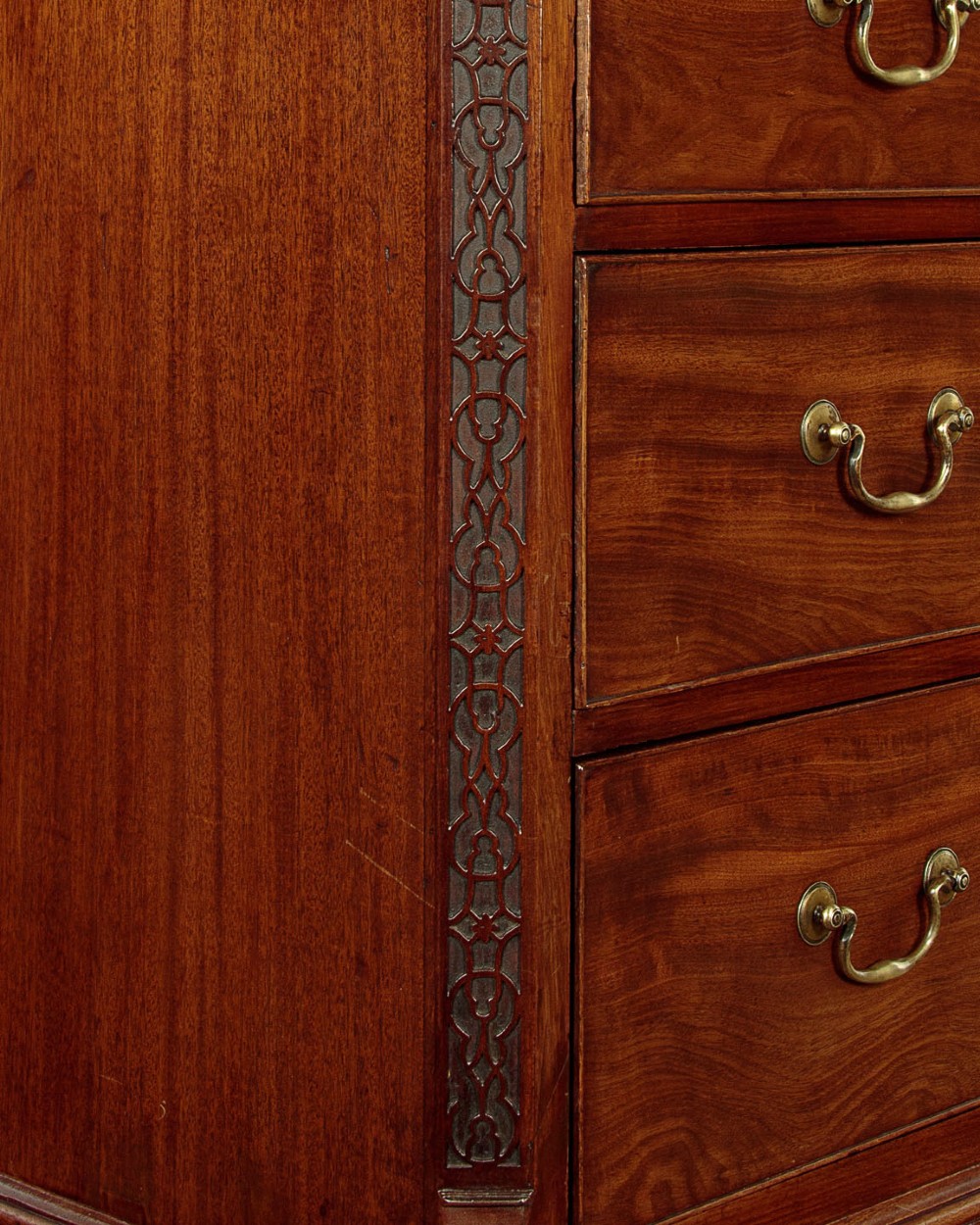 A Georgian mahogany chest on chest with two short over six long graduated drawers, featuring brass handles and bracket feet. View VI