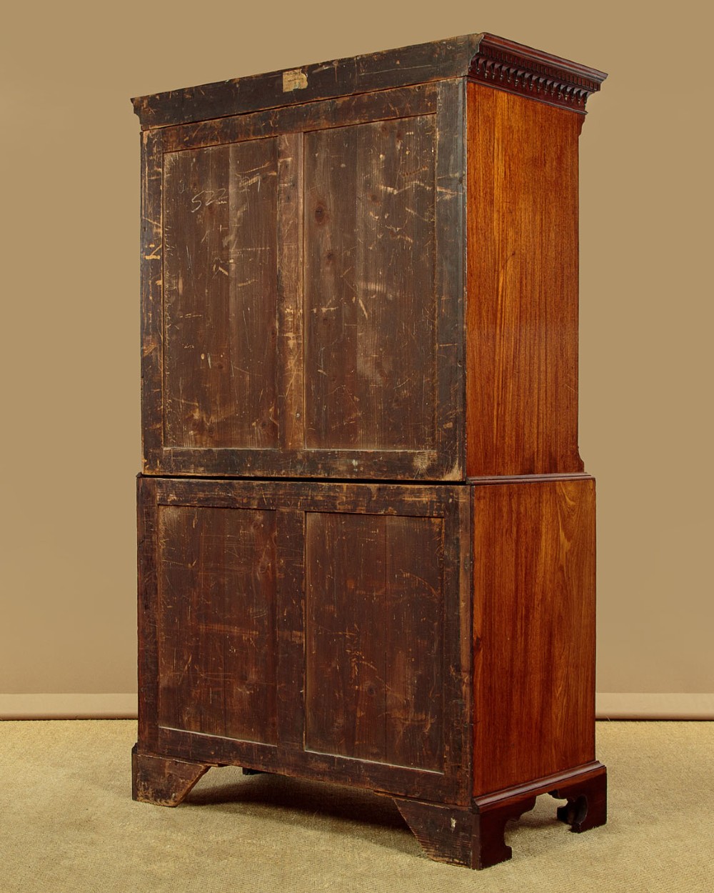 A Georgian mahogany chest on chest with two short over six long graduated drawers, featuring brass handles and bracket feet. View XIII