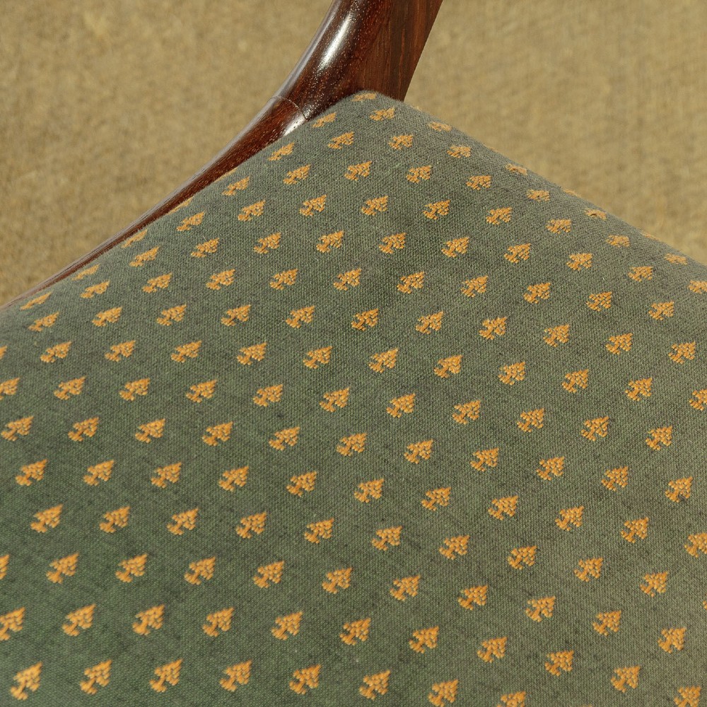 Set of six late Regency rosewood dining chairs featuring reeded front legs, sabre rear legs, and green patterned fabric upholstered seats and back panels. View X
