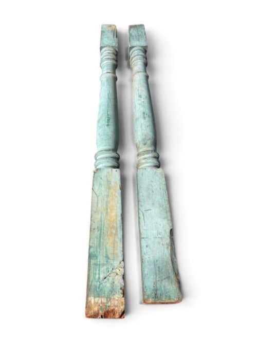 fig 1. A pair of 19th-century turned hardwood architectural columns featuring a weathered blue-green painted finish.