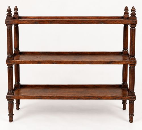 fig 1. An early 19th-century dark hardwood three-tier open shelving unit featuring fluted vertical columns, turned legs, and carved top finials.
