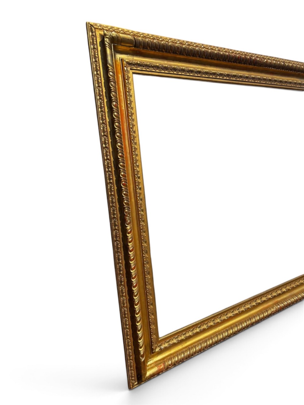 A rectangular 19th-century gilded wooden frame featuring detailed decorative moulding and a warm gold leaf finish. View IV