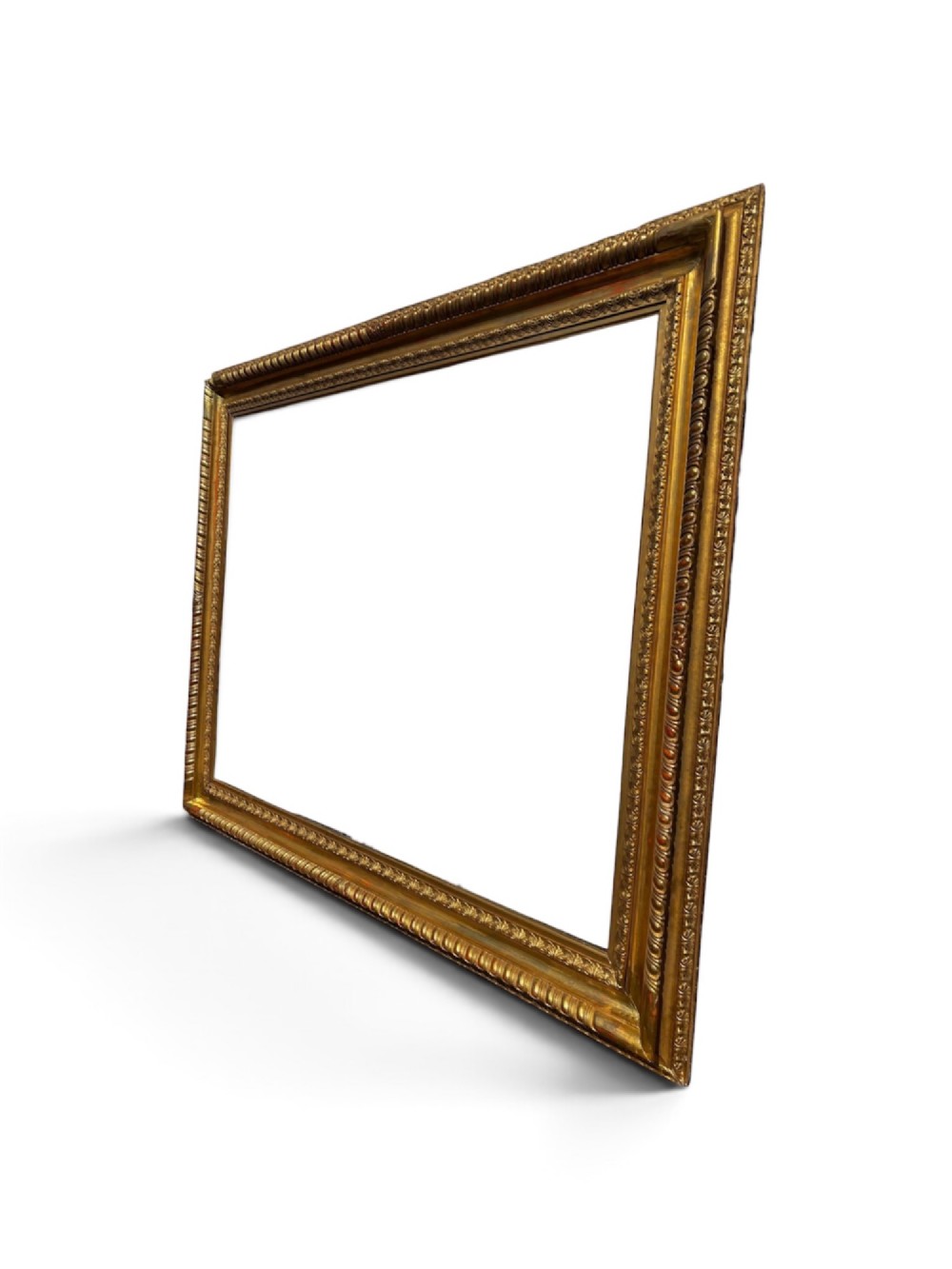 A rectangular 19th-century gilded wooden frame featuring detailed decorative moulding and a warm gold leaf finish. View V