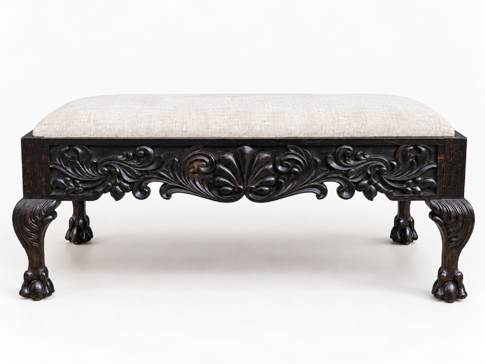 A 19th-century Ceylonese calamander wood stool featuring detailed floral relief carvings on the frame, cabriole legs with claw-and-ball feet, and neutral upholstered seat. View III