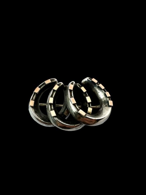 fig 1. Victorian Silver and Gold Lucky Seven Triple Horseshoe Brooch