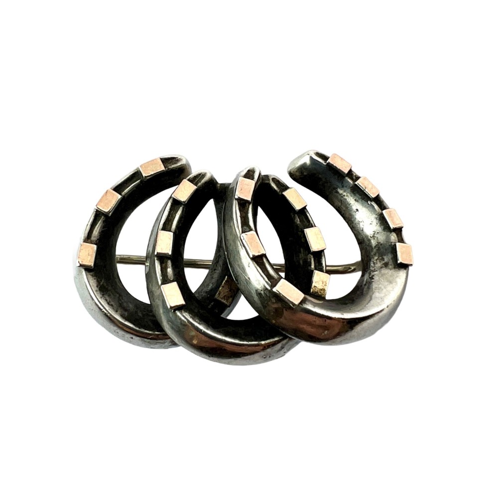 Victorian Silver and Gold Lucky Seven Triple Horseshoe Brooch