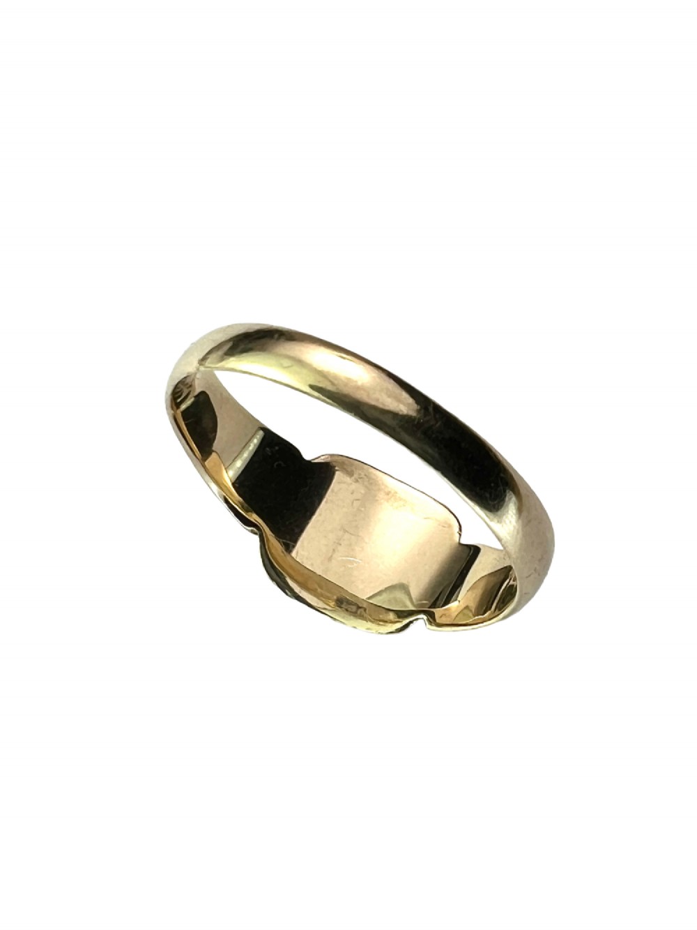 A vintage 9ct yellow gold signet ring featuring a textured rectangular face and a hallmarked inner band. View III