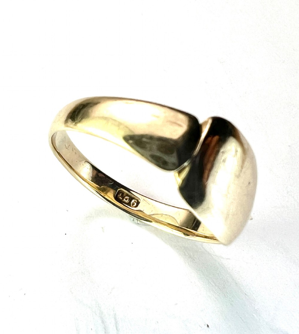 A vintage 9ct yellow gold signet ring featuring a textured rectangular face and a hallmarked inner band. View IV