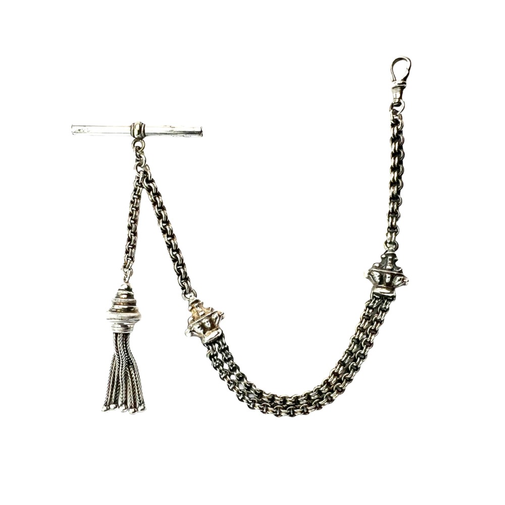 An antique silver Albertina watch chain featuring woven multi-strand links, a T-bar attachment, decorative sliding motifs, a swivel clasp, and a hanging tassel fob.