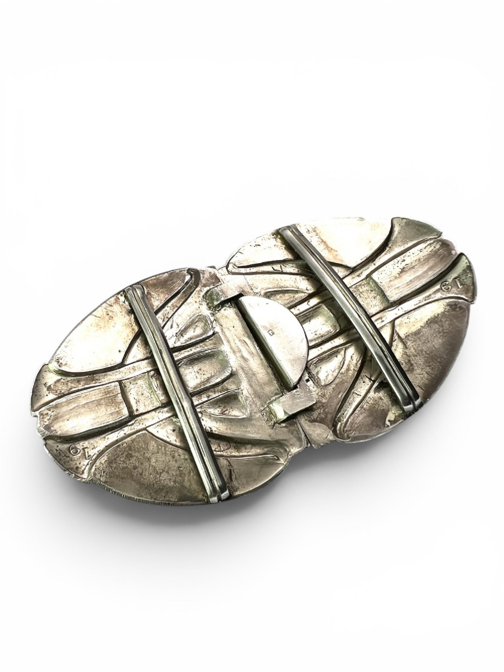 A two-part Art Nouveau sterling silver belt buckle featuring hand-hammered oval surfaces inlaid with vibrant blue and green enamelling and hallmarked in the centre. View IV