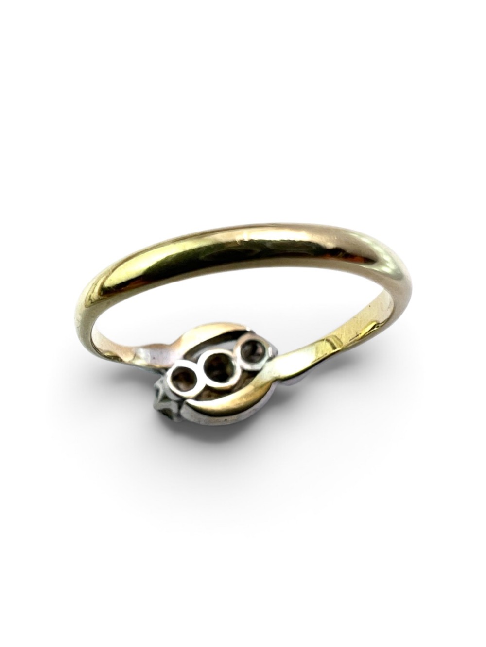 A vintage 18ct yellow gold and platinum ring featuring three small diamonds set in an ornate crossover mount with millegrain detailing. View II