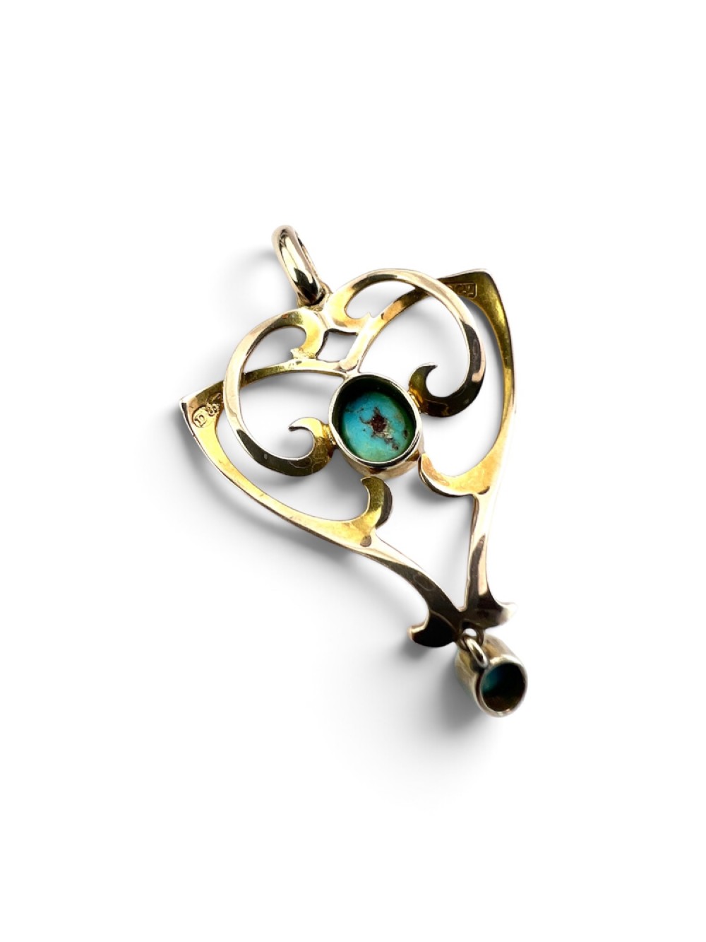 An Art Nouveau 9ct yellow gold openwork heart-shaped pendant set with a central turquoise cabochon and a dangling oval turquoise stone. View VI