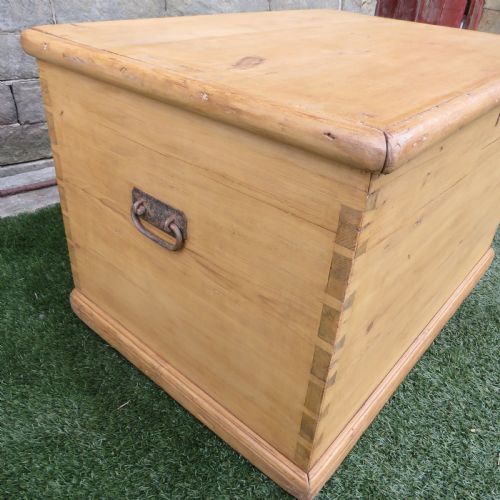 fig 2. A rectangular Victorian pine blanket chest featuring visible dovetail joint corner construction, a hinged top lid, and a moulded base.