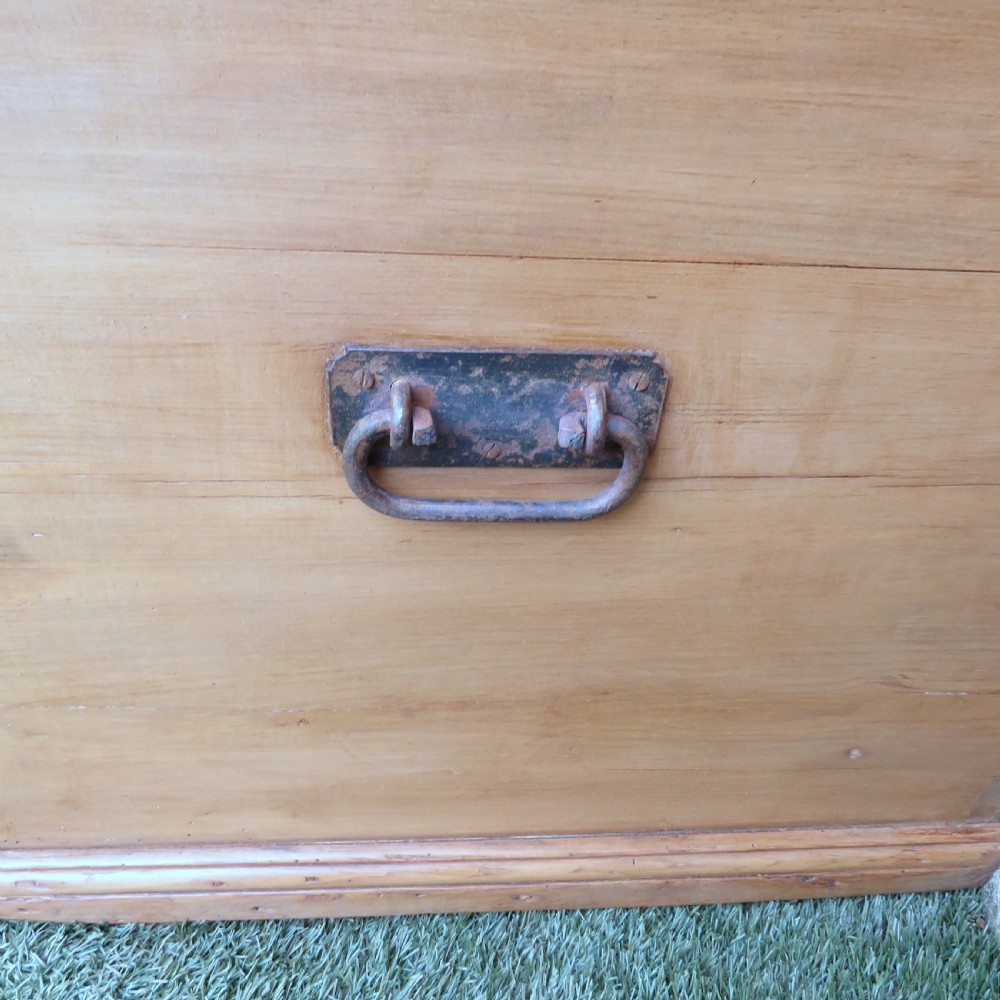 A rectangular Victorian pine blanket chest featuring visible dovetail joint corner construction, a hinged top lid, and a moulded base. View VIII