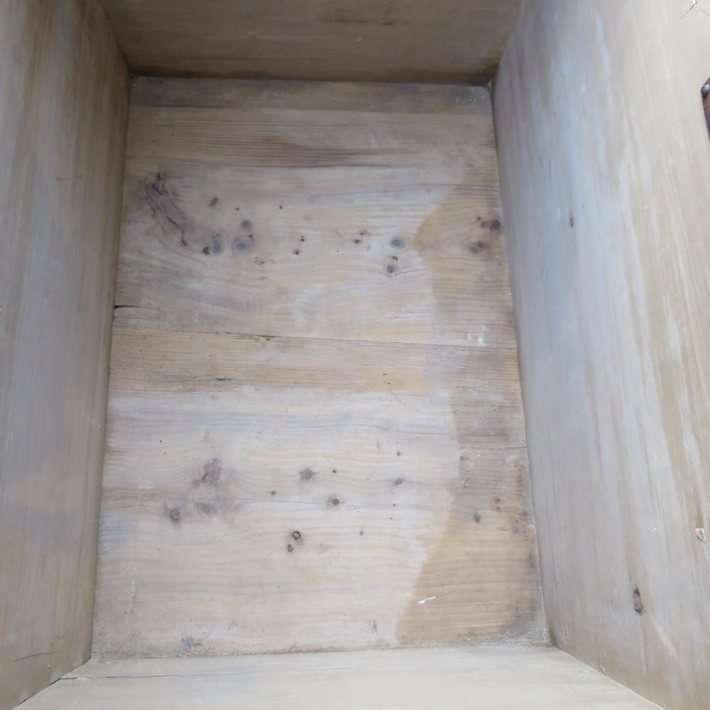 A rectangular Victorian pine blanket chest featuring visible dovetail joint corner construction, a hinged top lid, and a moulded base. View XII
