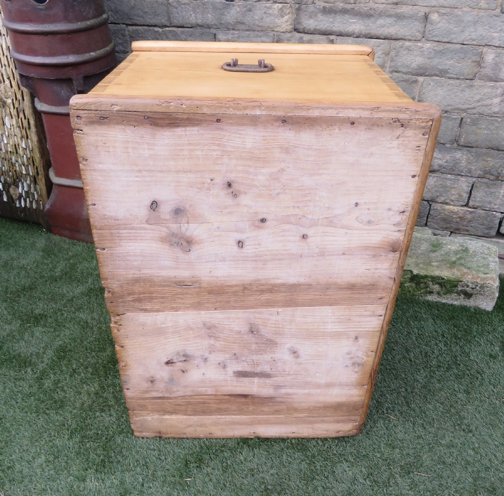A rectangular Victorian pine blanket chest featuring visible dovetail joint corner construction, a hinged top lid, and a moulded base. View XIV