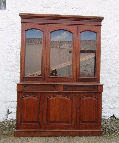 A Victorian Mahogany Three Door Library Bookcase