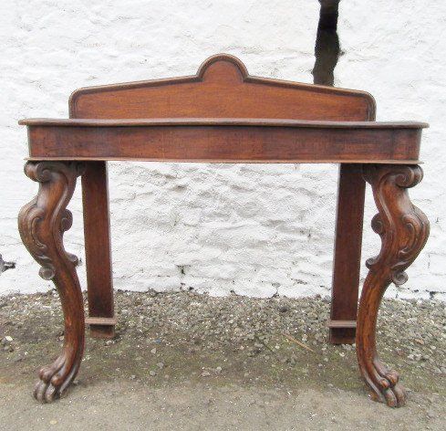 A Victorian Oak Serpentine Fronted Hall Table.