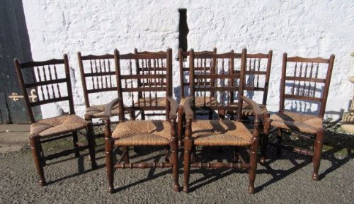 Set of Eight Victorian Rush Seated High Back Oak Dining Chairs.