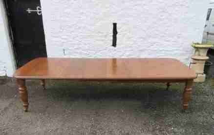 A Scottish Golden Oak Mid-victorian Dining Table with Four Extra Leaves.  J & T Scott Edinburgh
