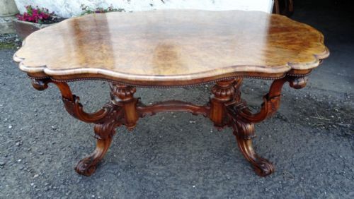 A Carved Victorian Burr Walnut Centre Table
