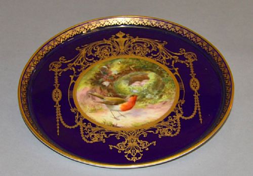 A Royal Worcester Gilded Plaque with Raised Edges.